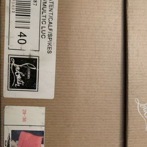 Christ Louboutin calf spikes red size 9